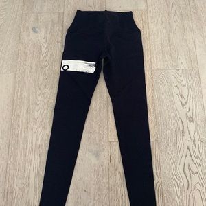 Womens Alo yoga leggings size S black with white lettering